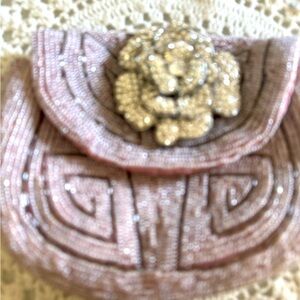 Deux Lux  clutch fully beaded and the brooch is beautiful.